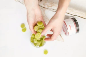Woman Picking Up CBD Gummies for Sleep