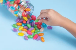 Man Holding CBD Gummies