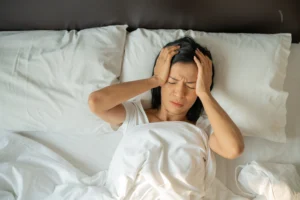 Woman Suffering from Headache Migrane