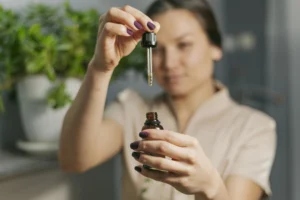 Therapist with THC-Free CBD Tincture Bottle